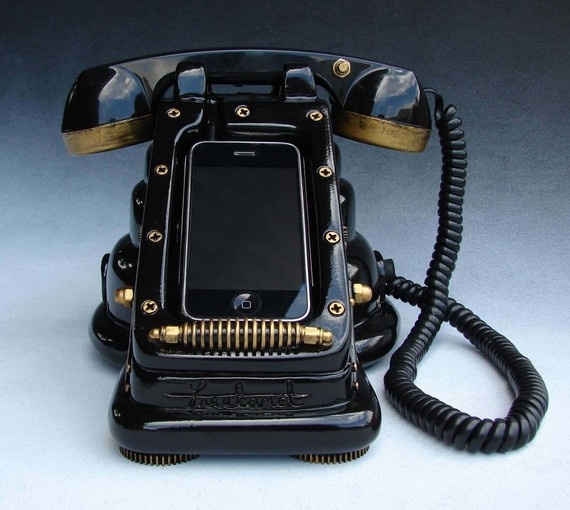 Strange steampunk-styled retro telephone hookup for an iPhone.